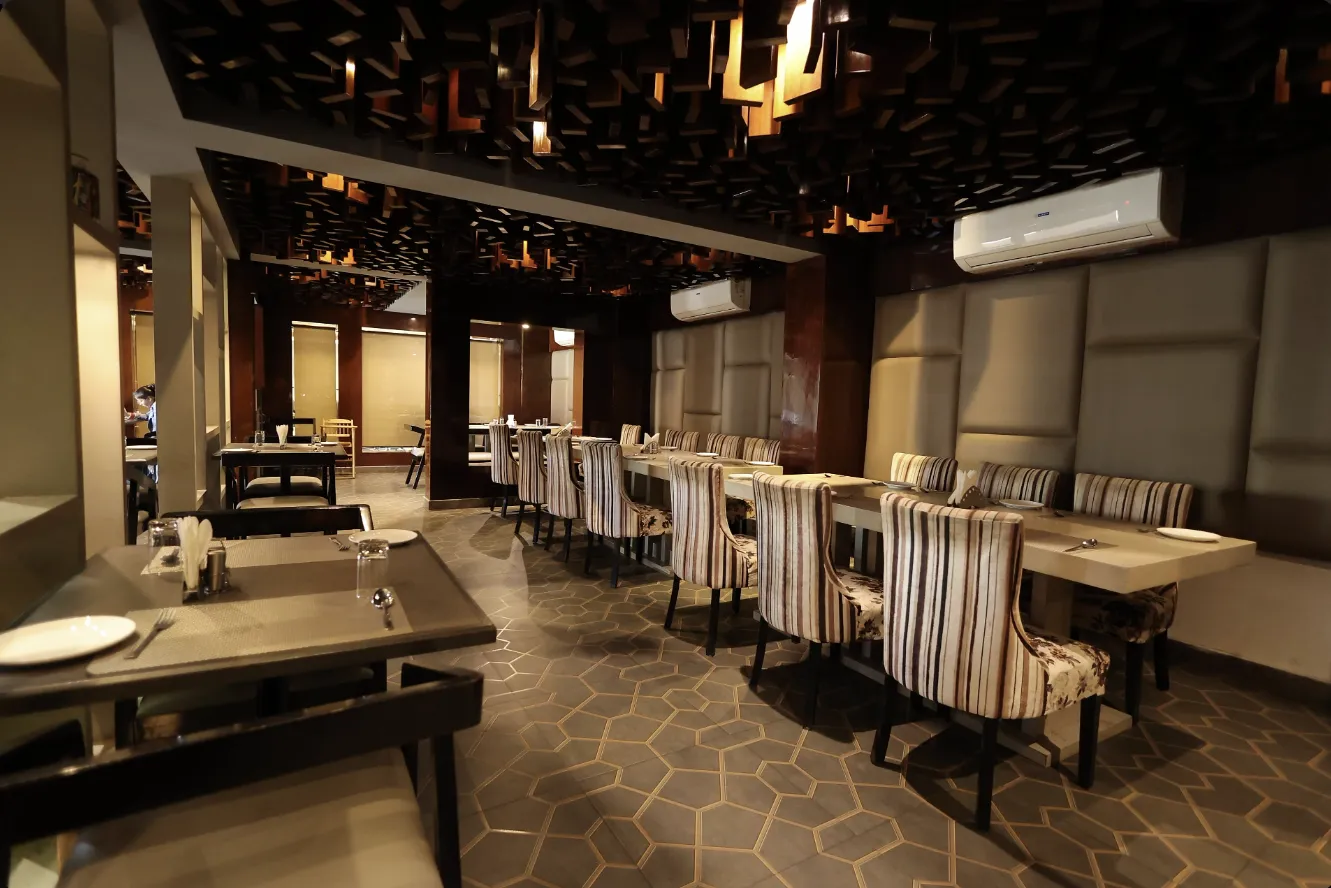 Tables and chairs at Kalpavriksha restaurant